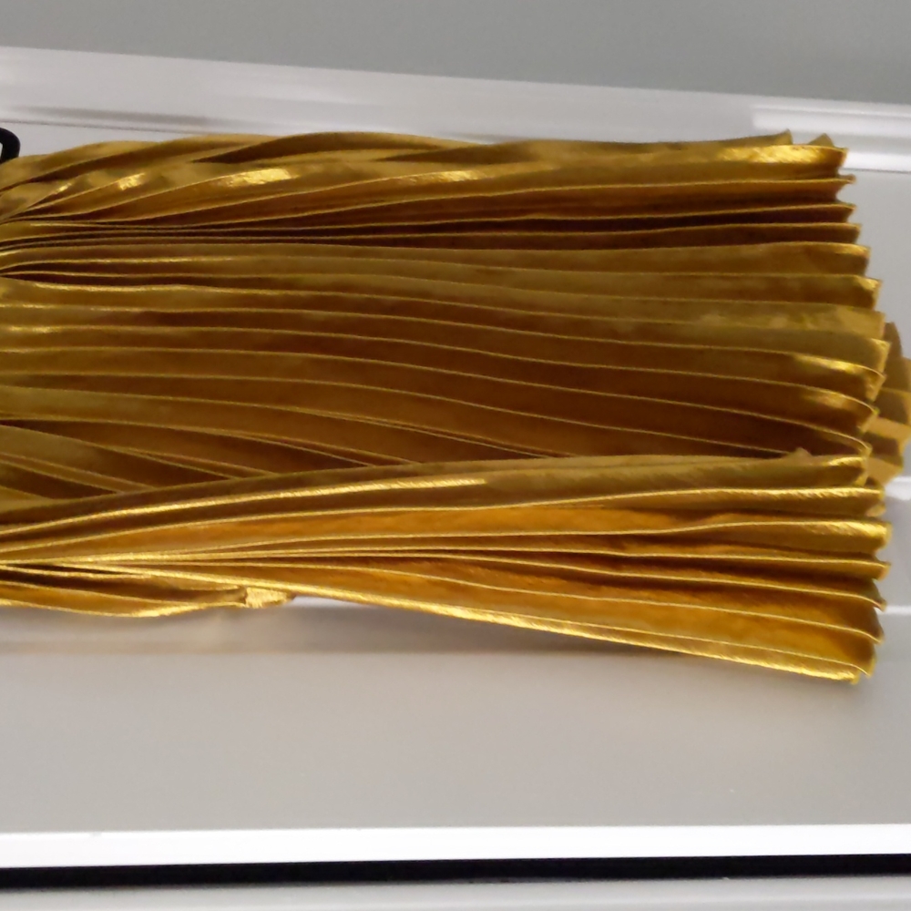 M gold pleated skirt